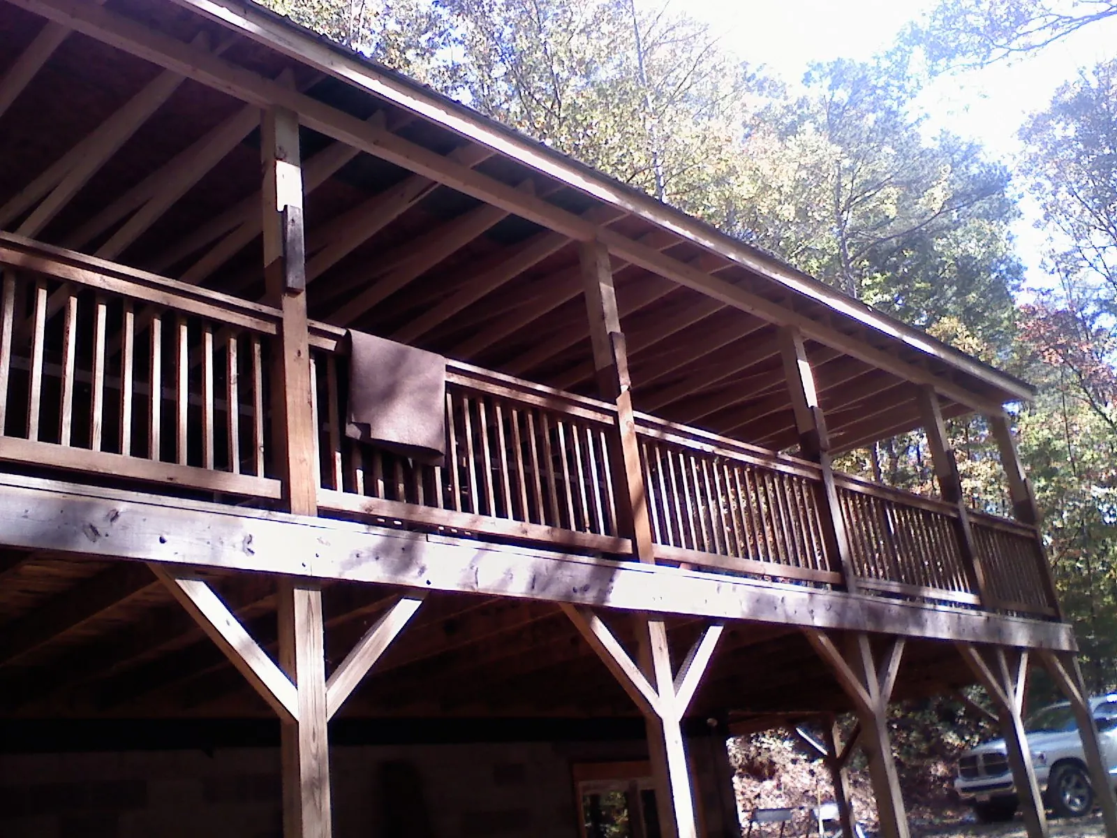 Timber framing under a new elevated porch and deck — Roof Leak Repair in Yancey by Roofing Brothers